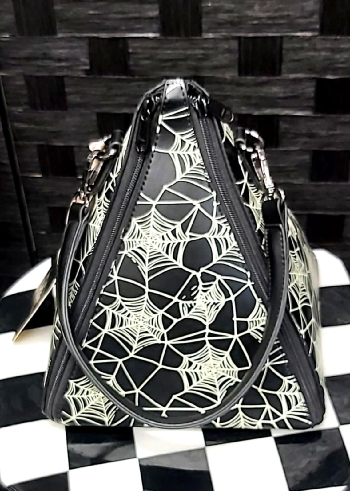 Pyramid spiderweb handbag