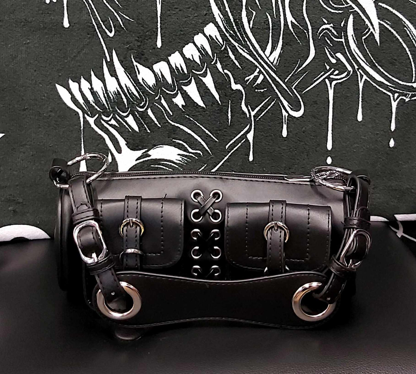Black leather barrel bag
