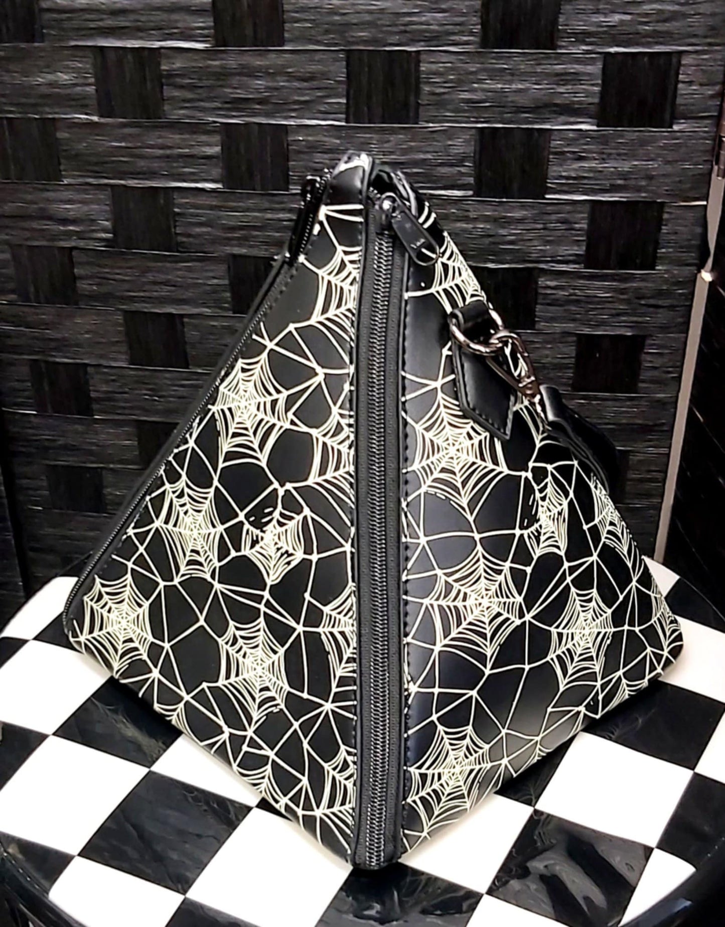 Pyramid spiderweb handbag