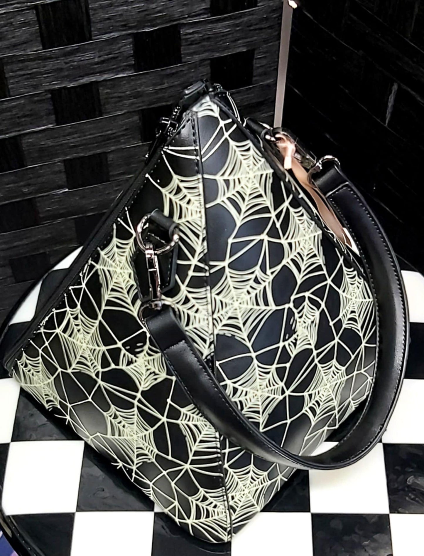 Pyramid spiderweb handbag