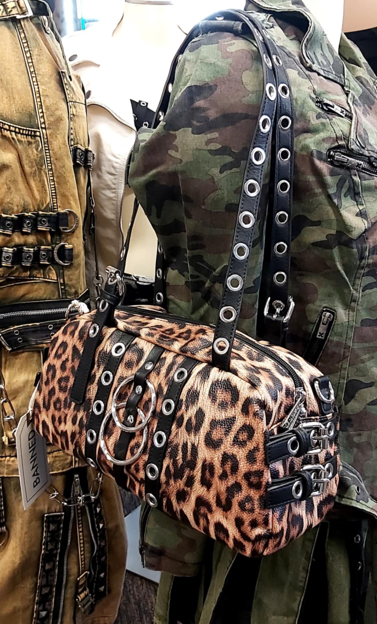 Leopard print barrel shaped handbag