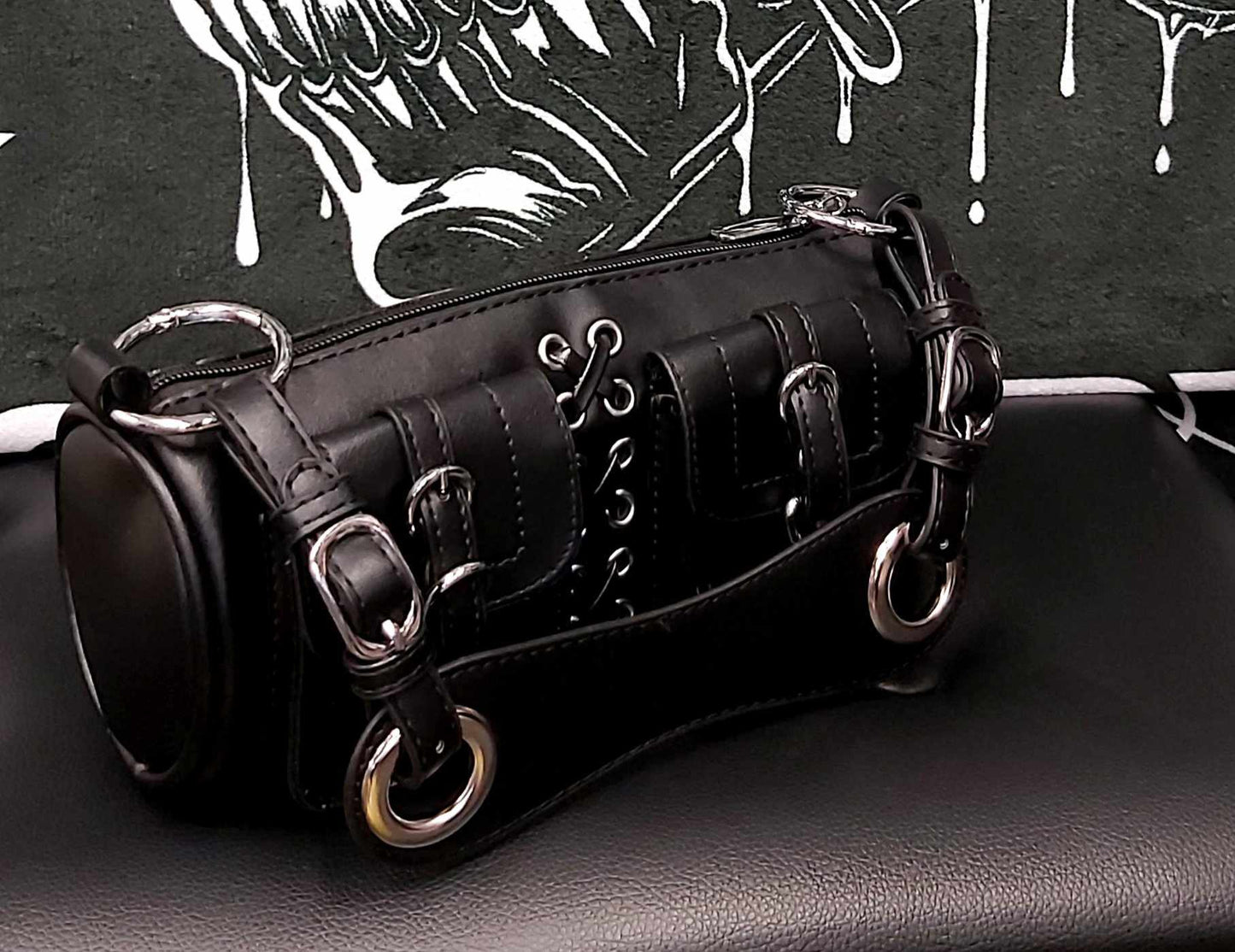 Black leather barrel bag
