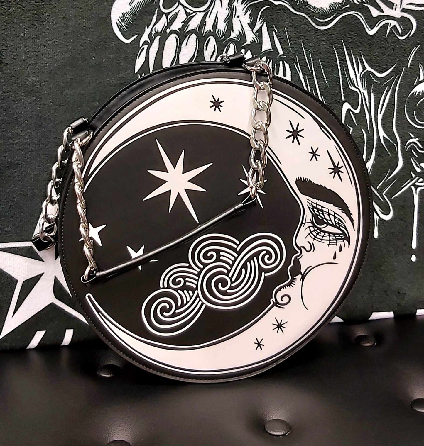 Crescent moon and stars round purse
