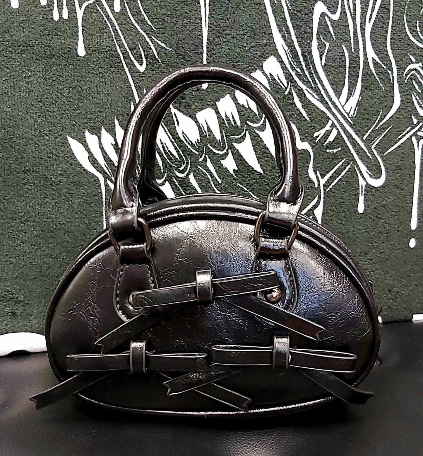 Small black faux leather handbag