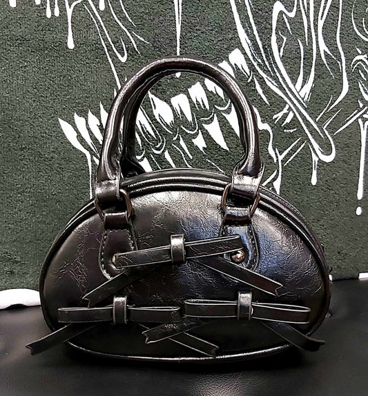 Small black faux leather handbag