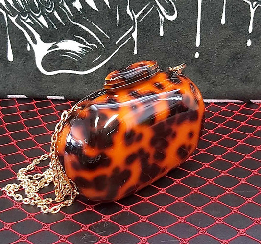 Acrylic oval shape leopard clutch