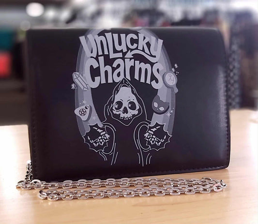 Unlucky Charms book clutch bag