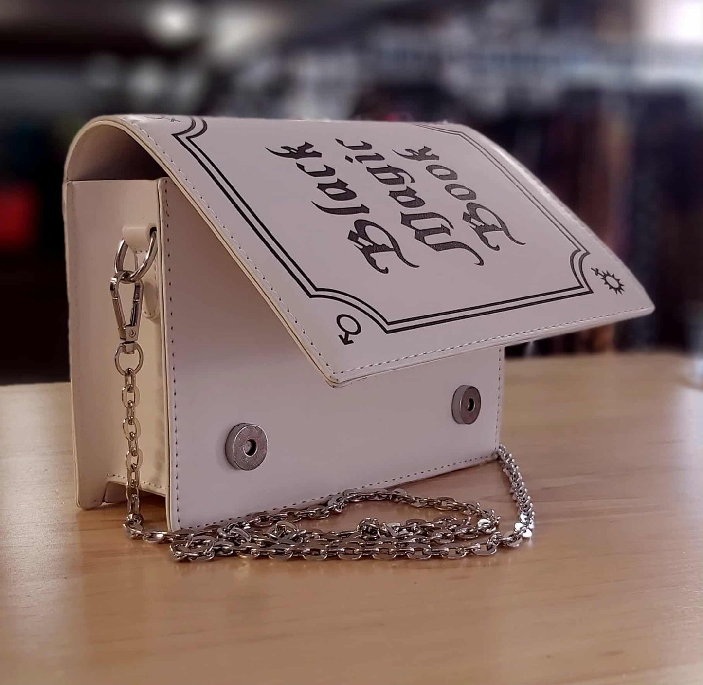 Black Magic book clutch bag (white)