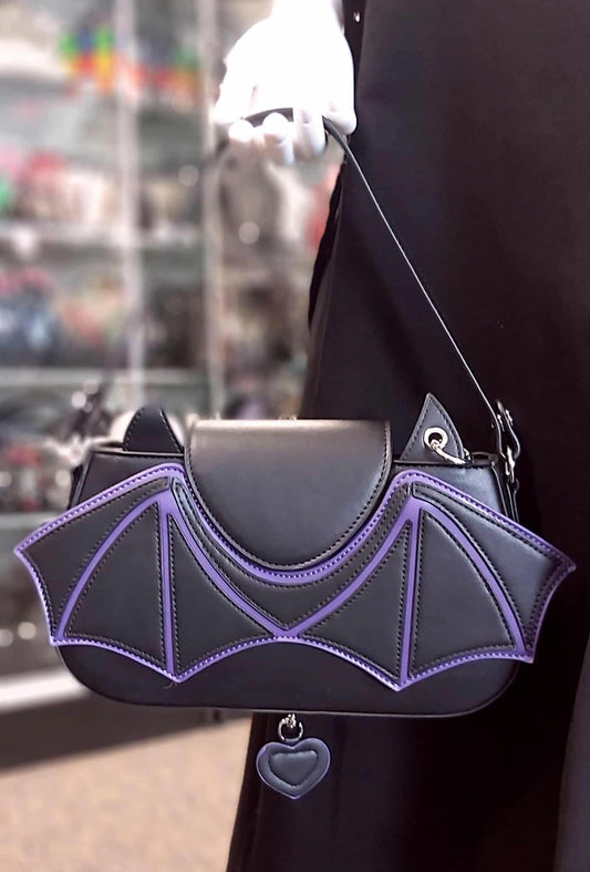 Purple bat wing handbag